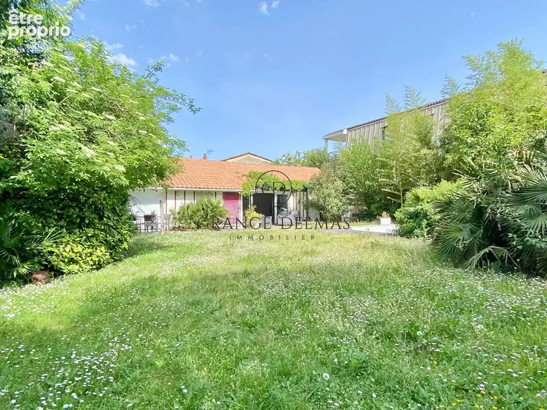 Maison plain-pied sur une grande  parcelle et stationnement - TONDU - photo 3