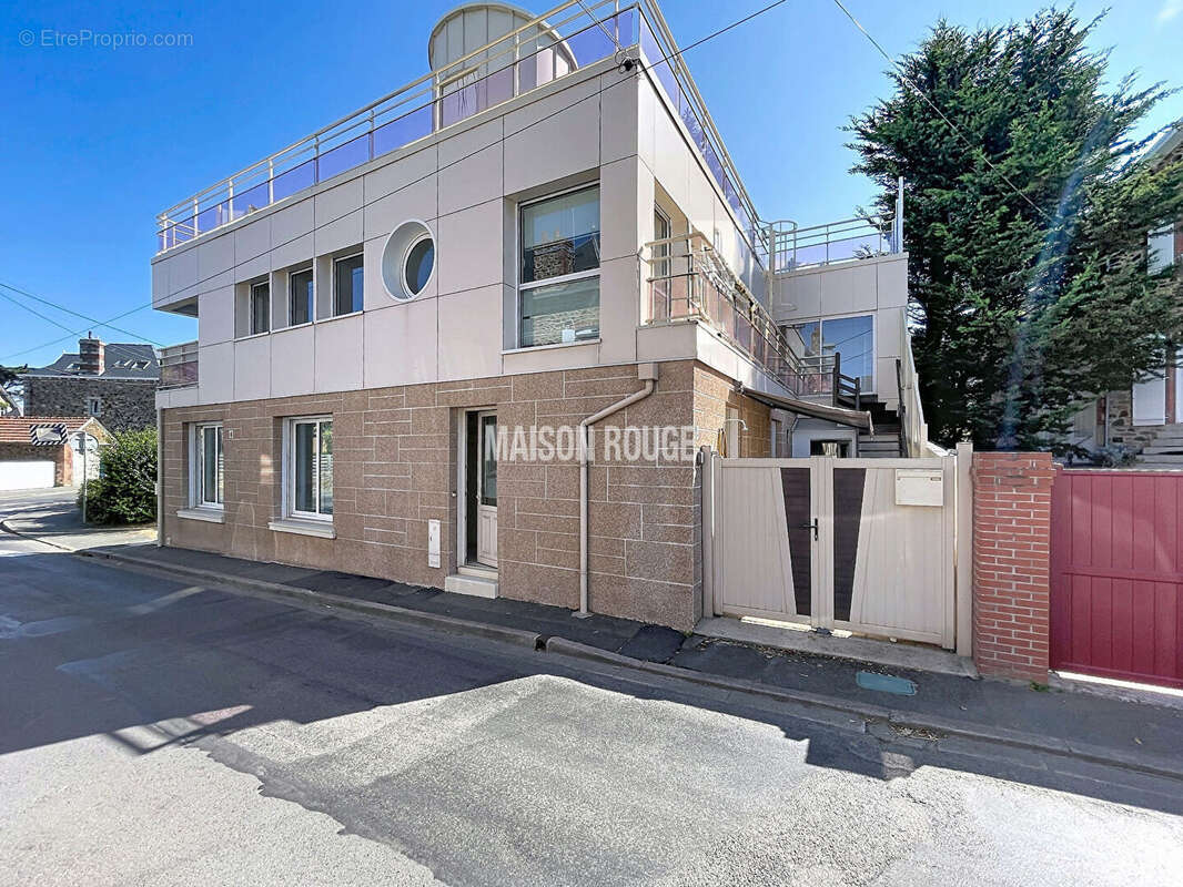 Immeuble d'exception avec roof-top, trois appartements au coeur du val-andre - photo 2