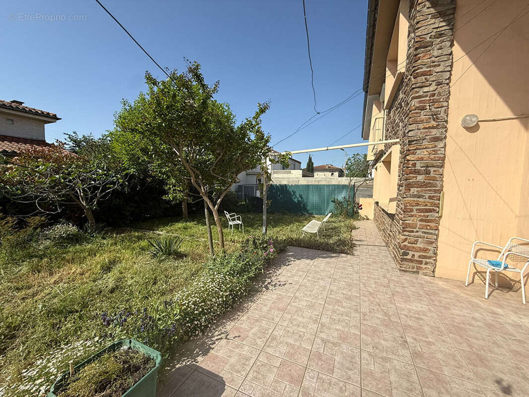 Maison familiale de 105 m² avec 4 chambres, garage motorisé et jardin à Grazailles - photo 5