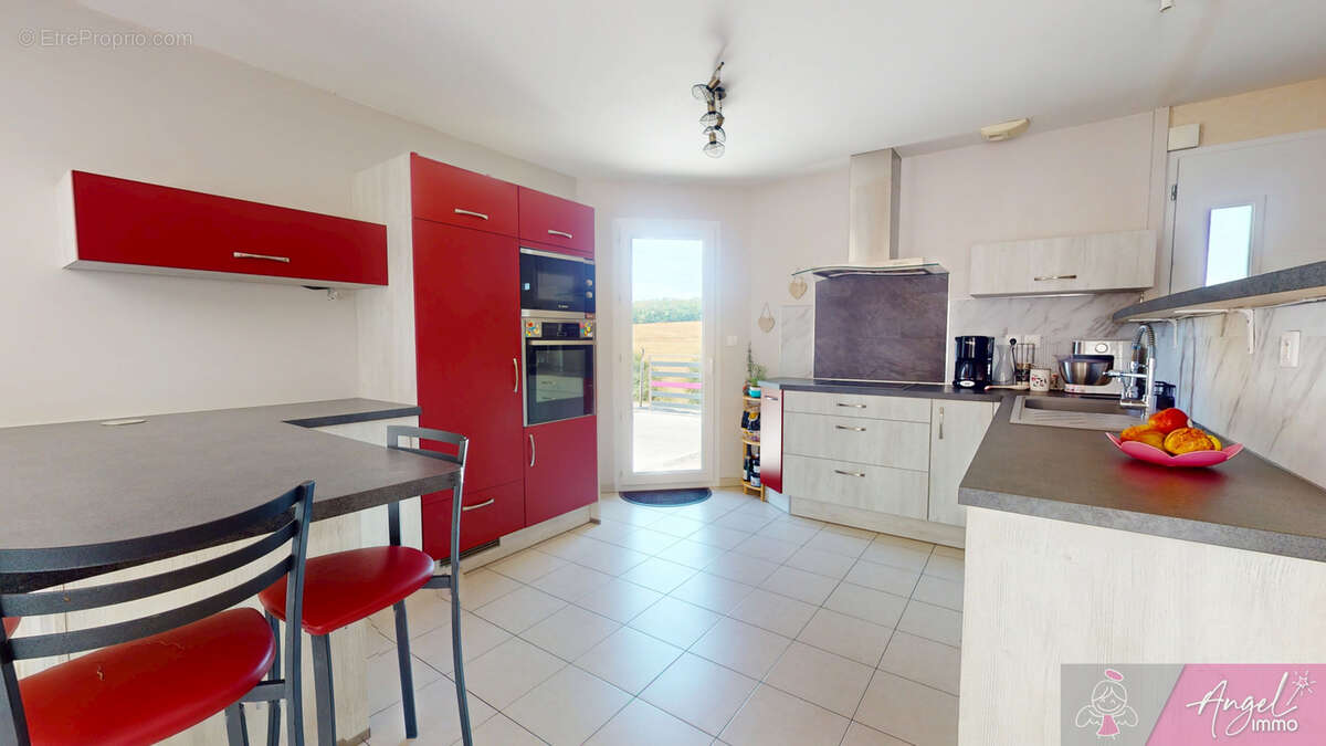 Maison romange sur terrain de 2427 m2 - photo 12
