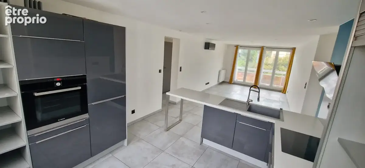Appartement T4 - balcon - garage et cave - photo 3