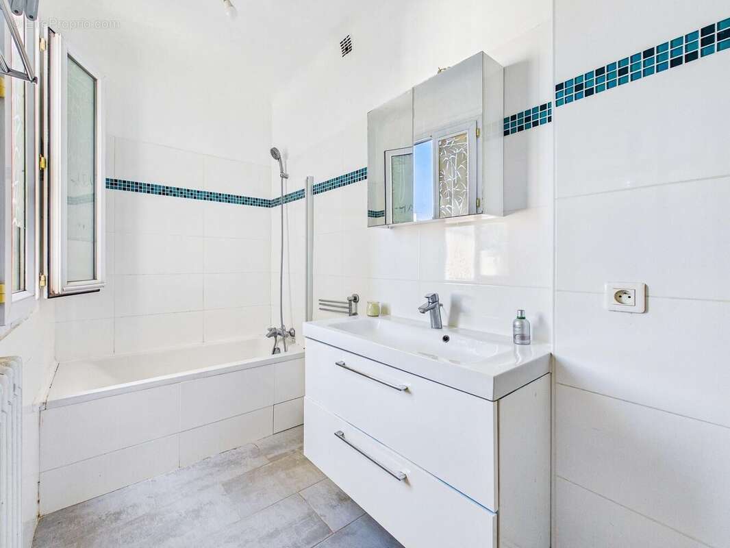 Photo 9 - Appartement à PARIS-17E