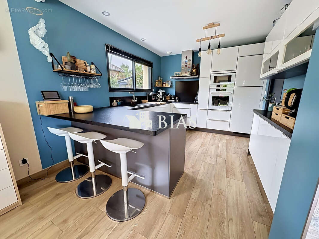 Maison 124 m² à Bourg-Achard  - photo 7