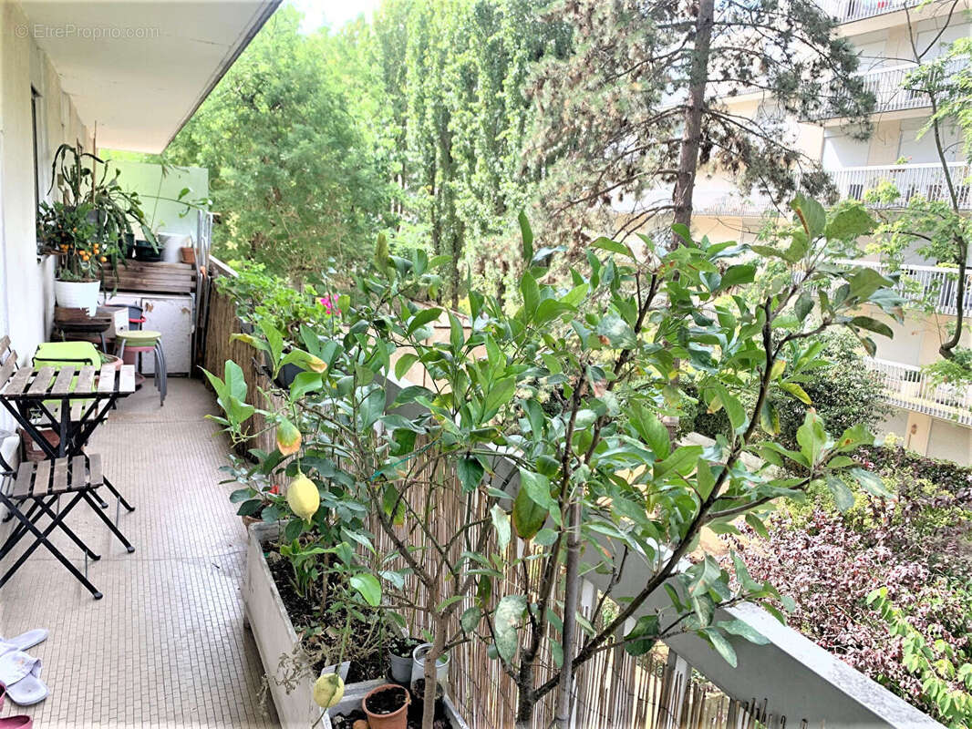 Appartement  4 pièce(s) 93m² + Cave +2 Parkings - photo 5