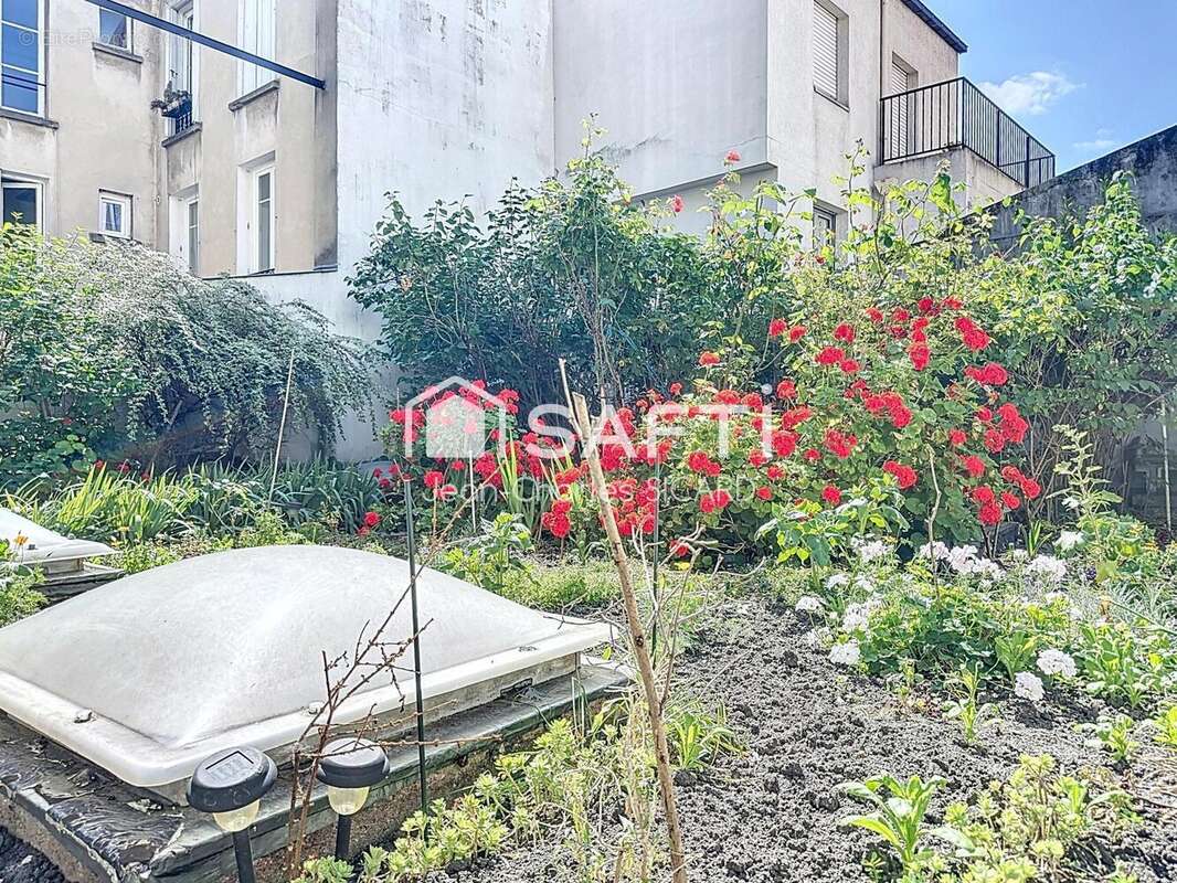 Photo 2 - Appartement à PARIS-15E