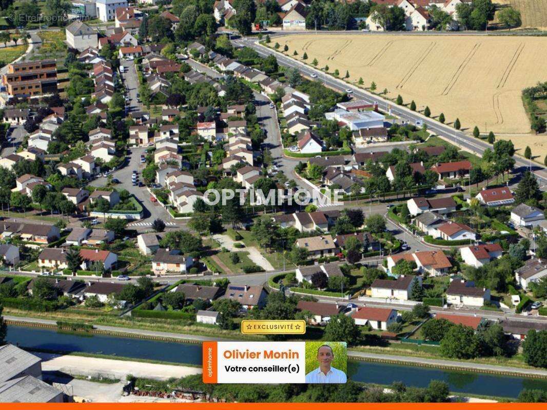 Au calme à Longvic, Maison de 90 m2 rénovée et élevée sur sous-sol - photo 4