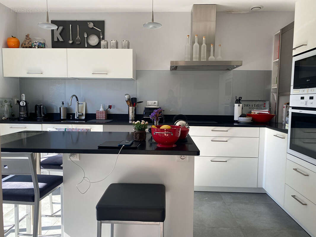 Maison contemporaine de 160 m²  au sol sur une parcelle de 360 m² orientée Sud avec garage. - photo 9