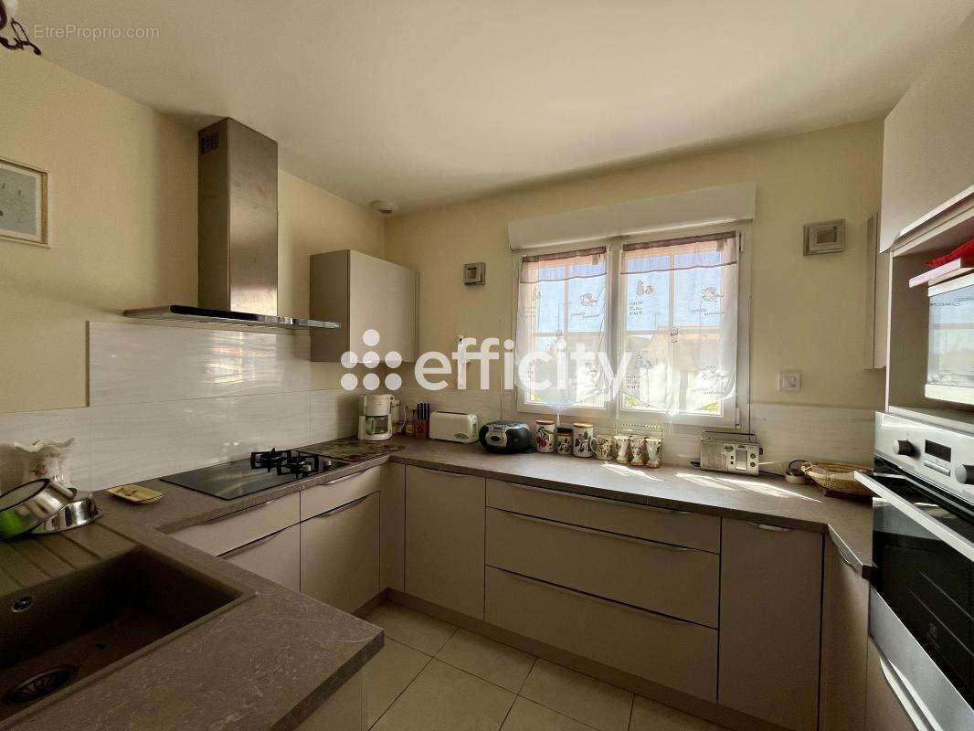 Maison 80 m² à Buxerolles  - photo 7