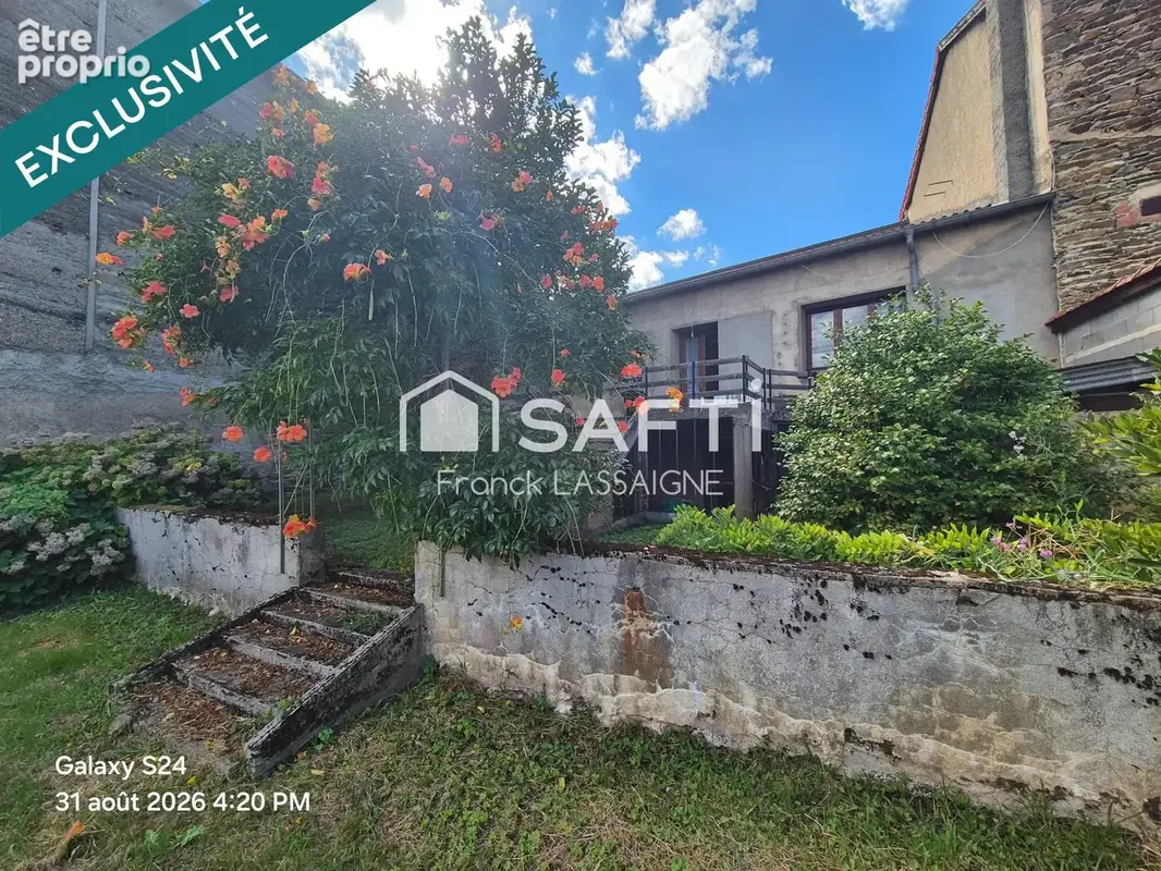Photo 1 - Maison à ARLANC