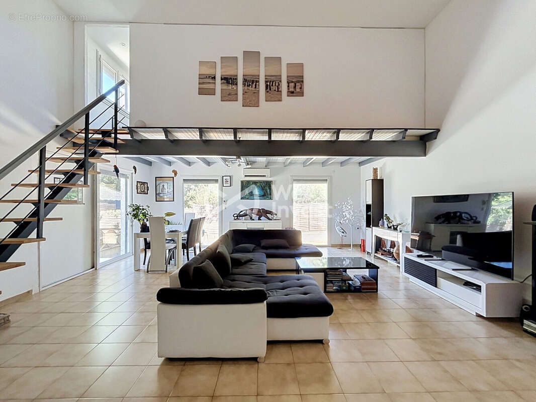 Maison 130 m² à Saint-Aunes  - photo 4