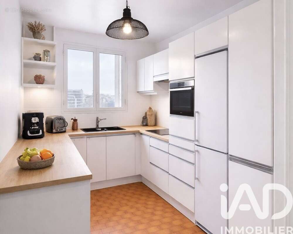 Photo 9 - Appartement à COURBEVOIE