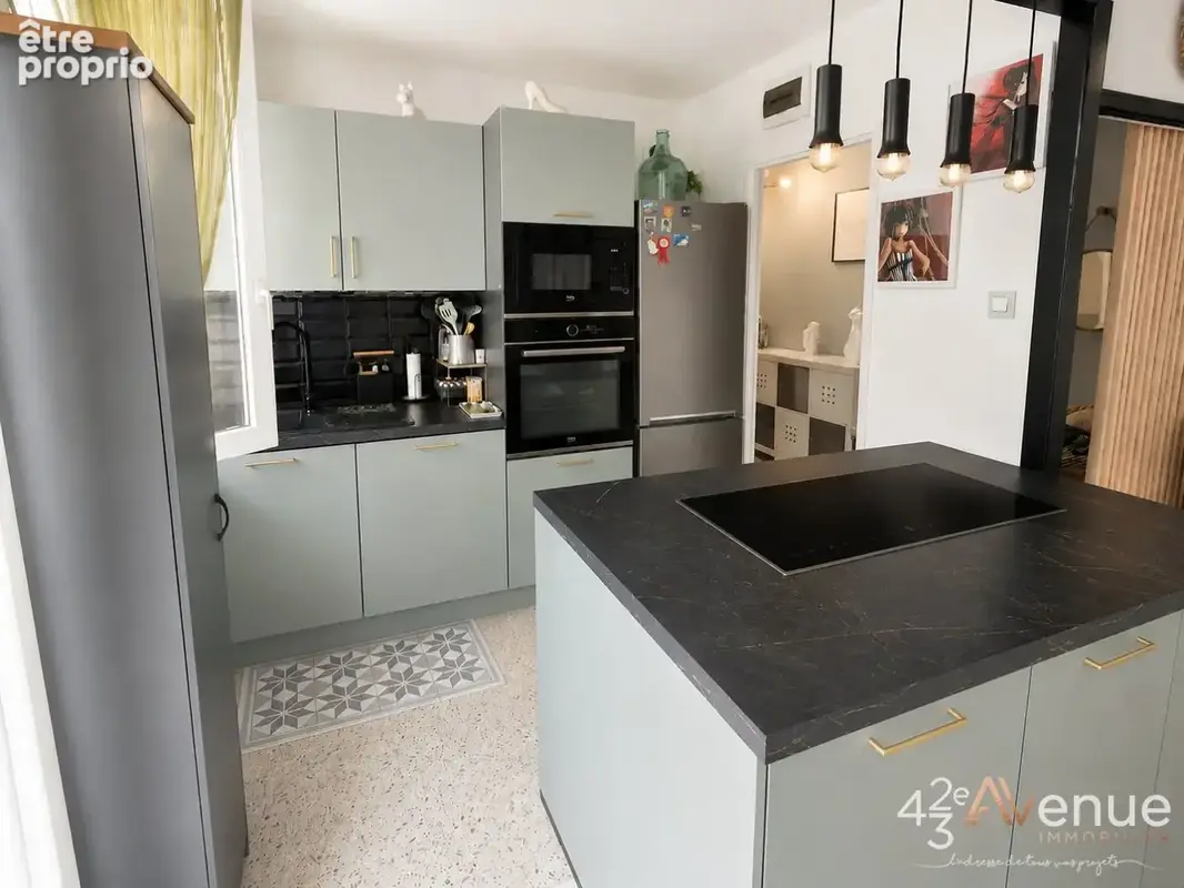 Appartement 5 pièces 89 m² à vendre à Saint-Etienne (42000) - photo 2