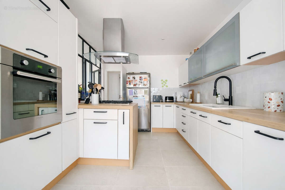 Maison Plain-pied IGNY - photo 5