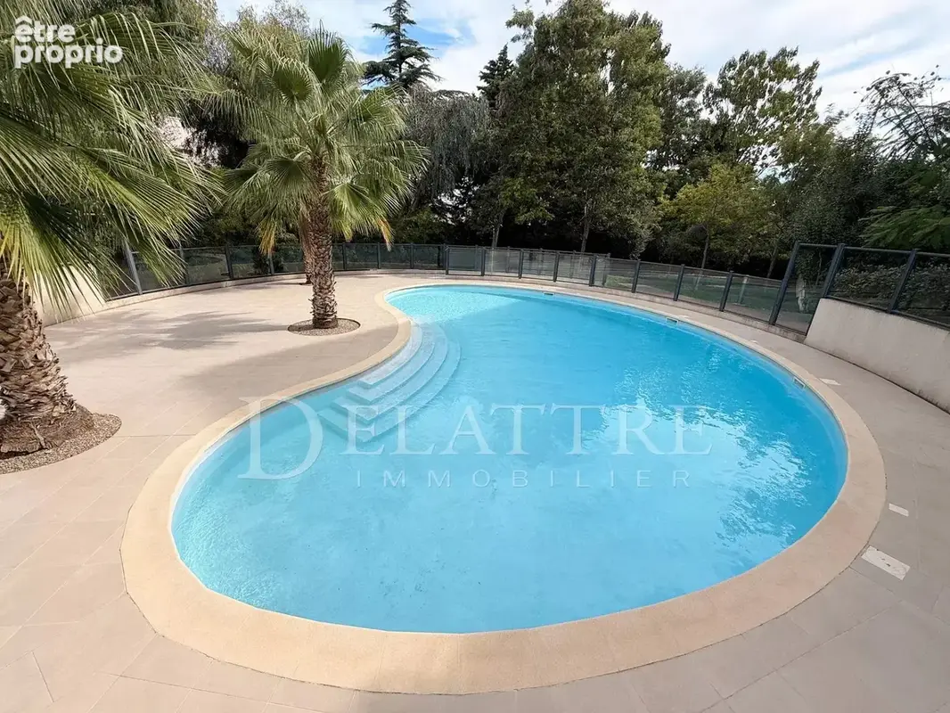 2 pièces rez-de-jardin avec piscine, garage et vue verdure - photo 2