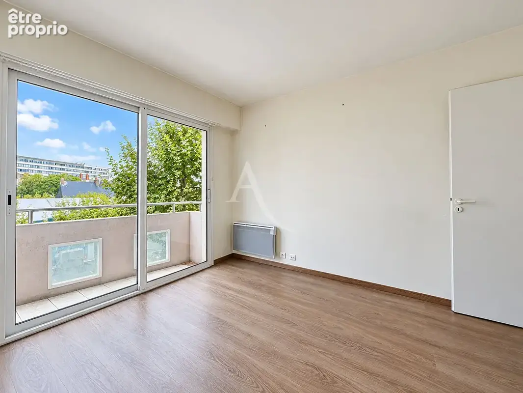 Appartement T3  en centre-ville avec garage - photo 6