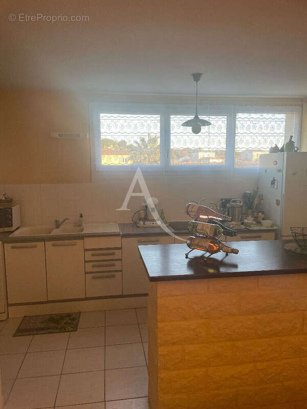 Vauvert T3 actuellement loué avec terrasse et garage - photo 2