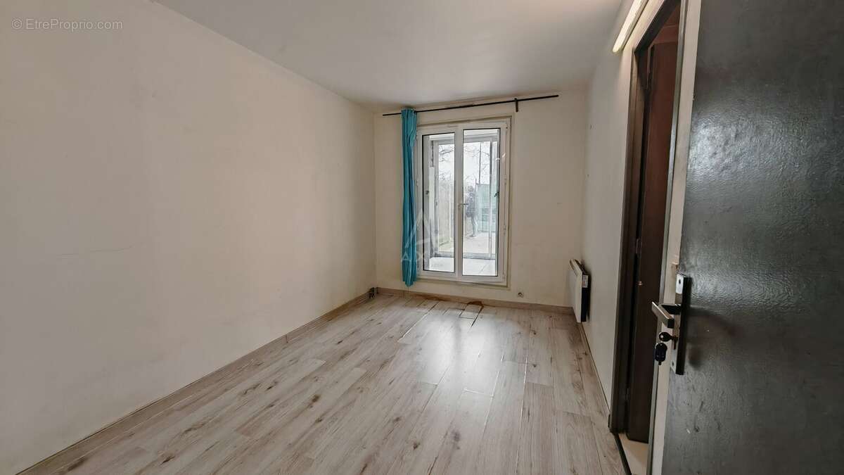 Appartement T4 au RDC avec terrasse 50 m²- Proche transport RER - photo 7