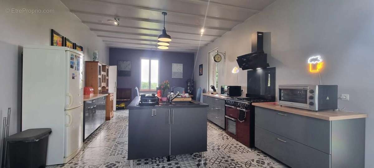 Maison à CASTELNAU-MONTRATIER