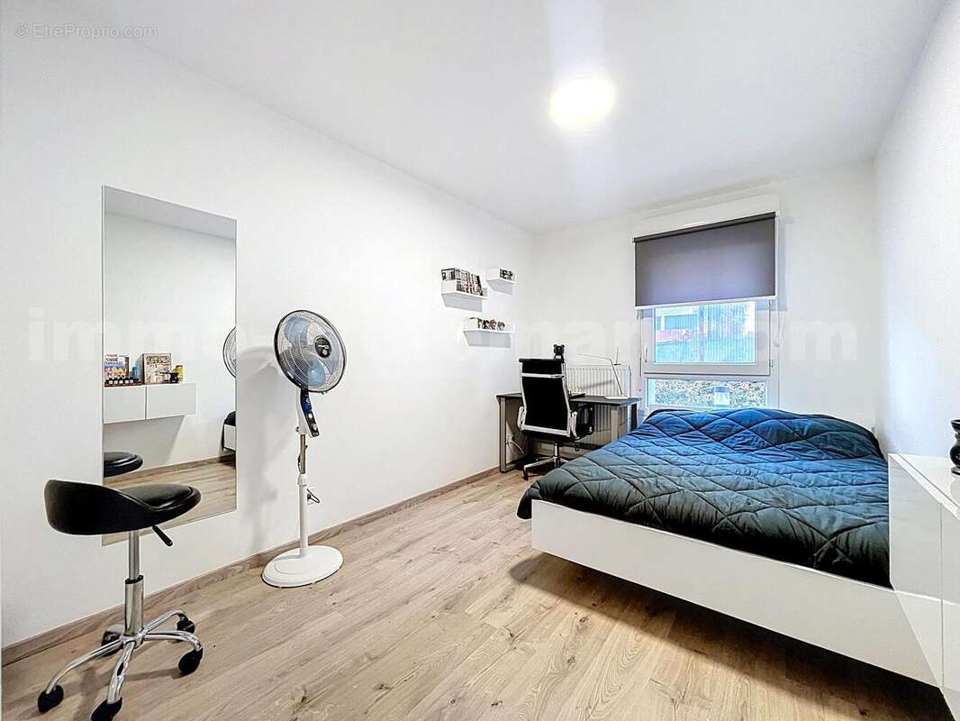 Appartement_T3_Annemasse_Genève_Ceva_tramway_Suisse_investissement_hyper_centre_Séjour_cuisine_terrasse_jardin_chambre_1_ - Appartement à ANNEMASSE