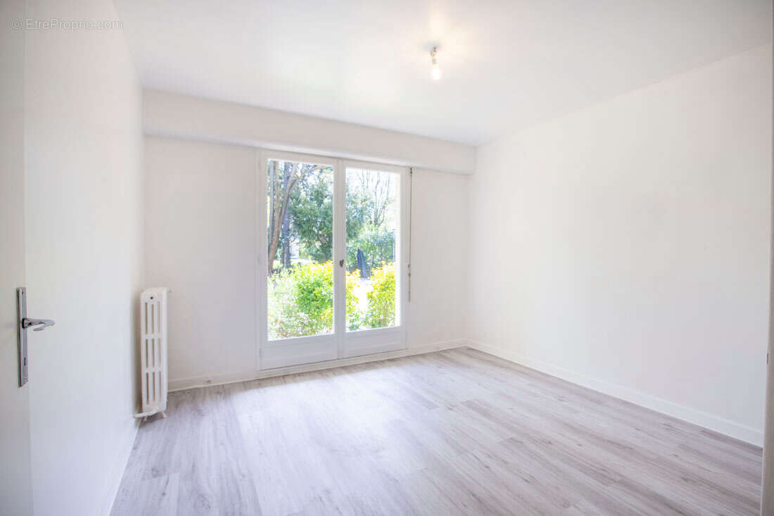 Potentiel T4 en rez-de-jardin - calme absolu au coeur du quartier des Musiciens - photo 8