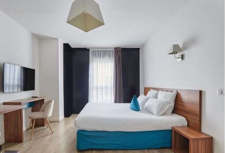 INVESTISSEMENT LOCATIF  RUEIL MALMAISON  Résidence Odalys Campus Paris Rueil - 5.02% de rentabilité - photo 2