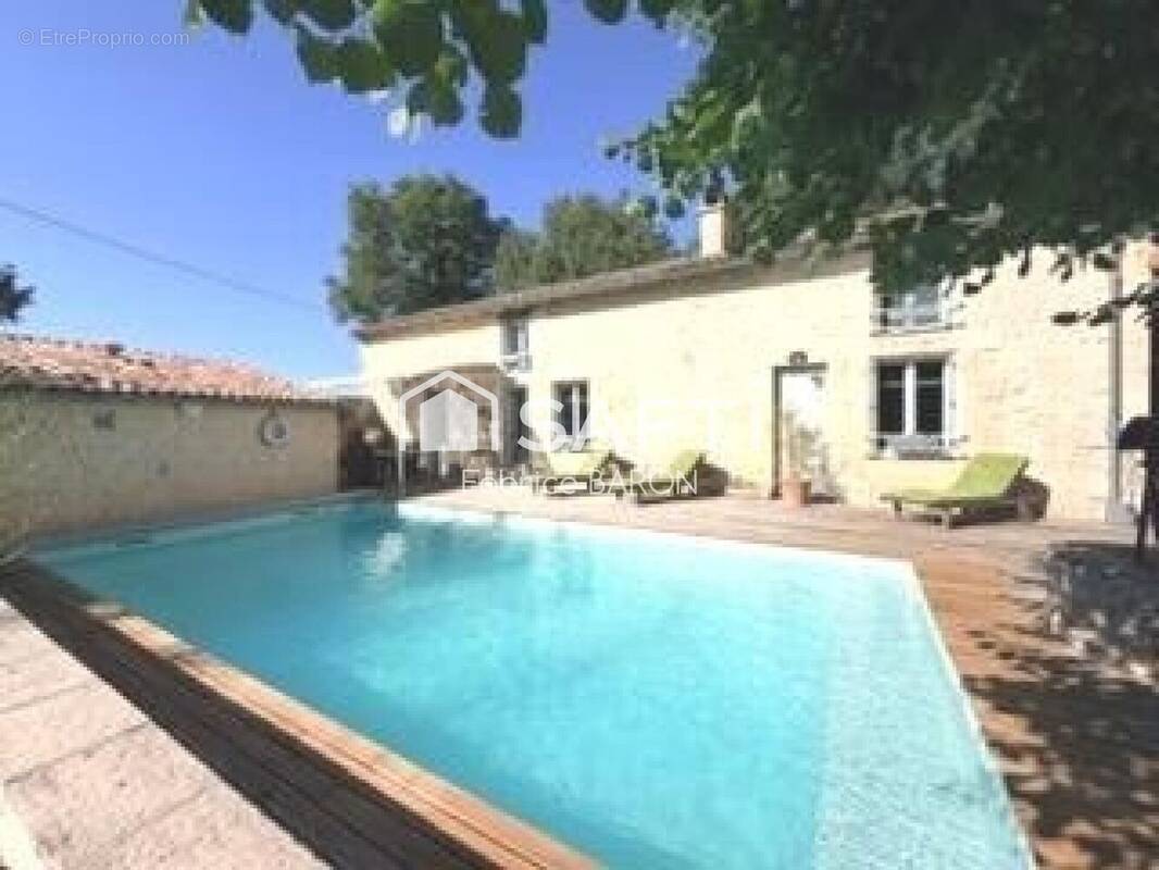 Photo 1 - Maison à MIGNALOUX-BEAUVOIR