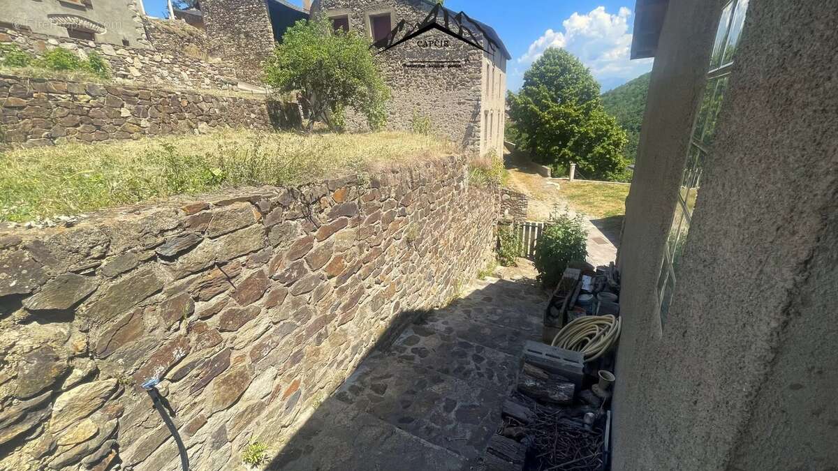 Maison 4 faces en pierre avec jardin - AYGUATÉBIA-TALAU - photo 38