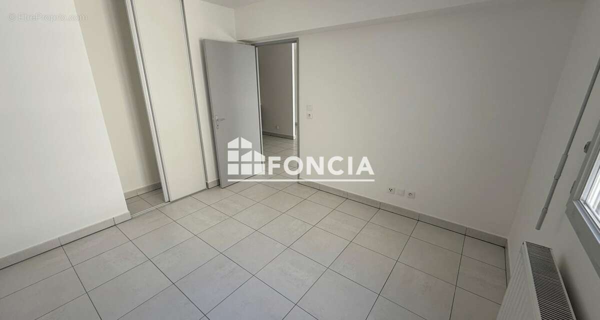 Appartement 3 pièces avec un grand balcon et une place de parking privative situé en plein centre-ville! - photo 4