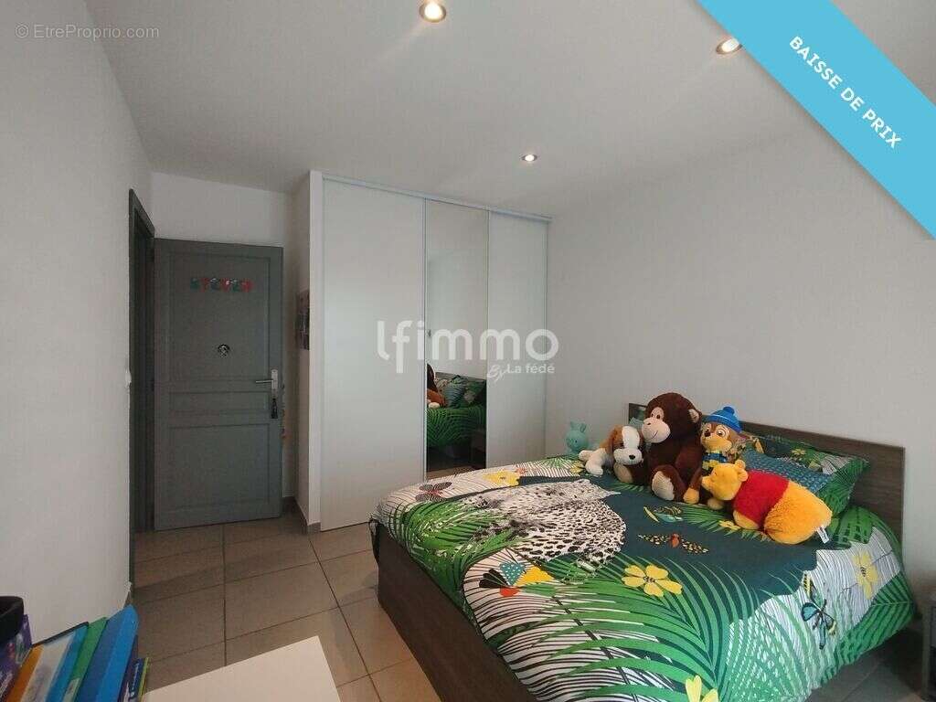 Maison 3 faces - 130 m2 - 5 chambres - Theza - photo 13