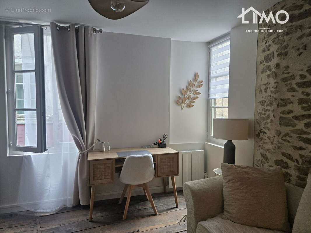 n°1 - Appartement à SAINT-LEONARD-DE-NOBLAT
