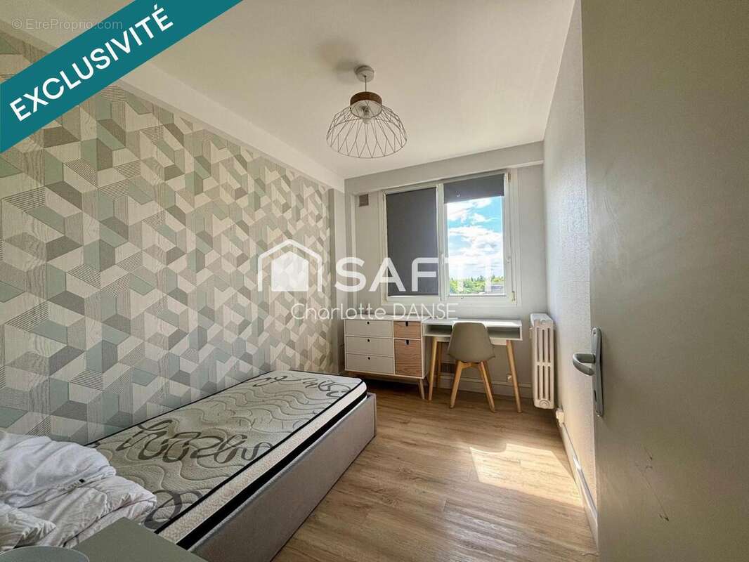 Photo 9 - Appartement à HEROUVILLE-SAINT-CLAIR