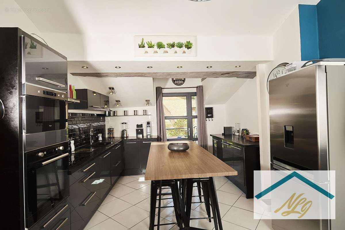 Maison de 80 m2 avec jardin - photo 3