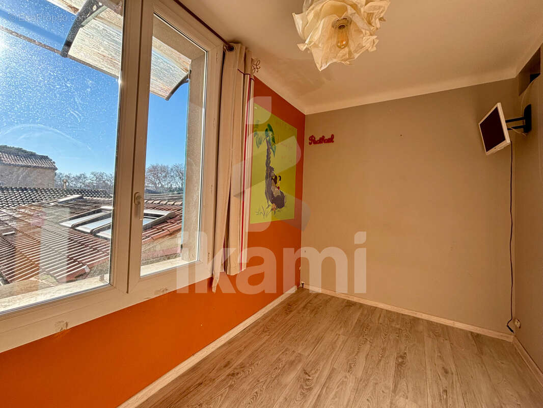 Maison à LAUDUN-L'ARDOISE