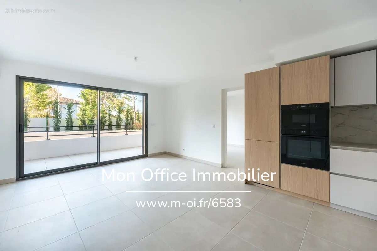 Référence : 6583-ABO. - Appartement neuf  et lumineux, 2 pièces, Terrasse + Parking privatif - photo 7