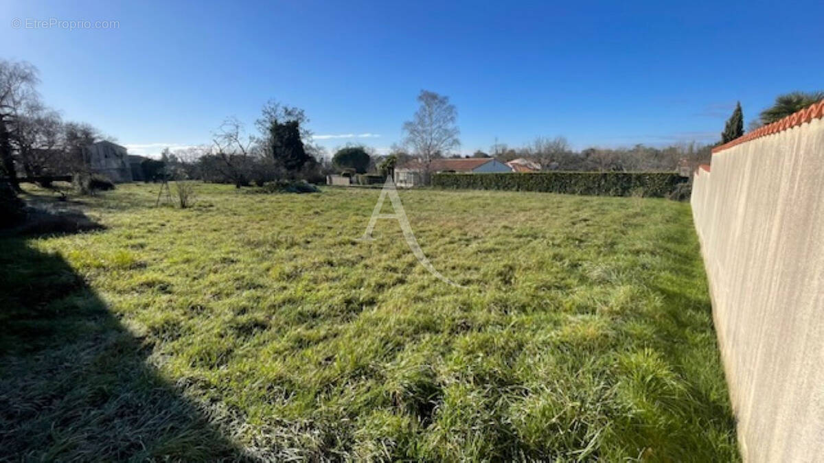 Terrain à PONT-L'ABBE-D'ARNOULT