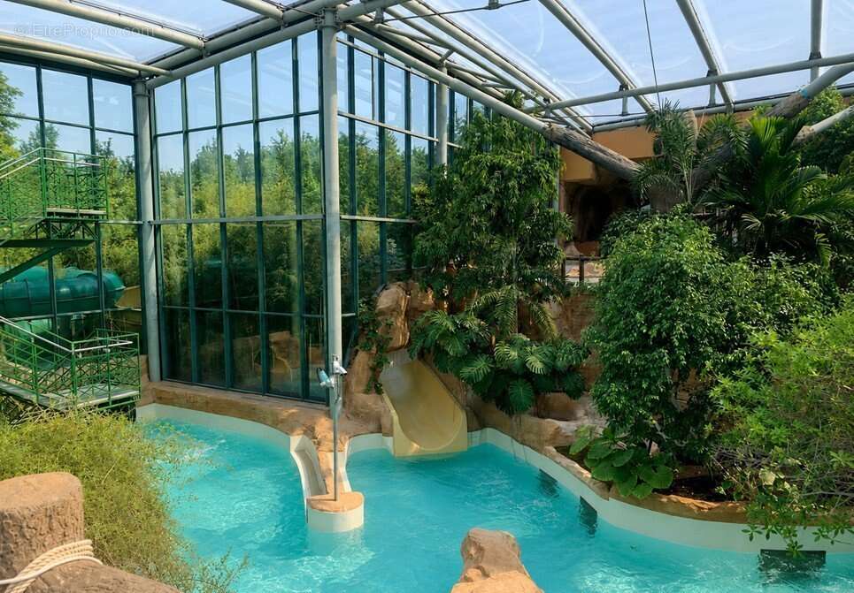 INVESTISSEMENT LOCATIF  CHAMOUILLE  Résidence de tourisme Center Parcs Le Lac d'Ailette - 6.52% de rentabilité - photo 7