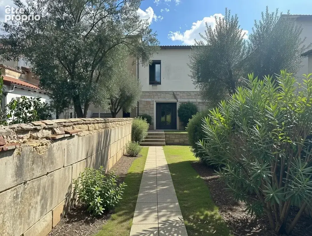 Maison en pierre 100 m² – Beaux volumes – Jardin – DPE D - photo 3