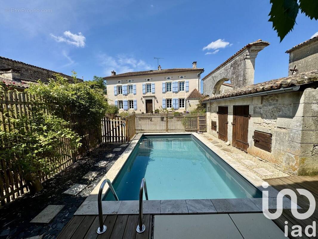 Photo 1 - Maison à BIGNAC