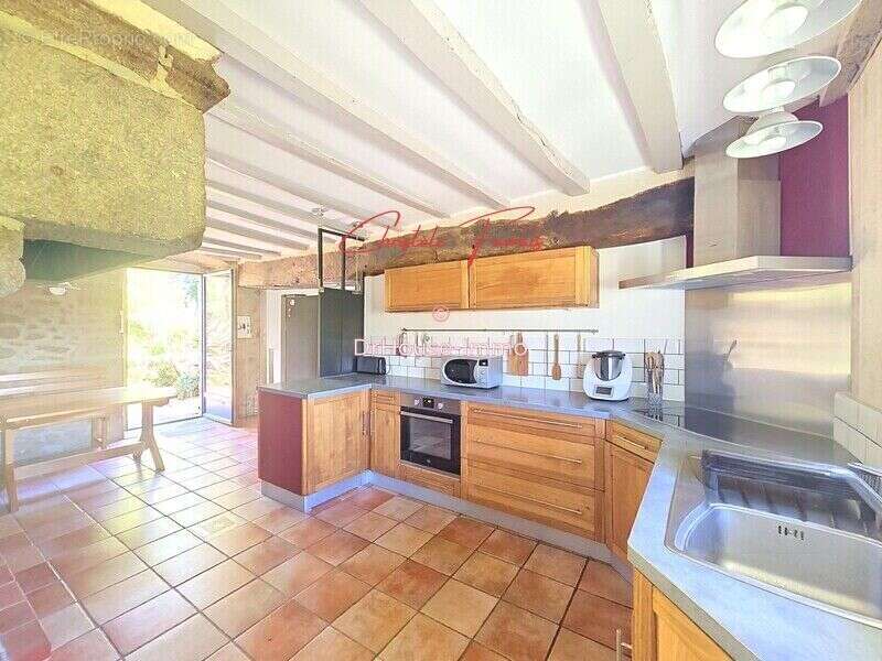Maison 155 m² à Louvigne-Du-Desert  - photo 7