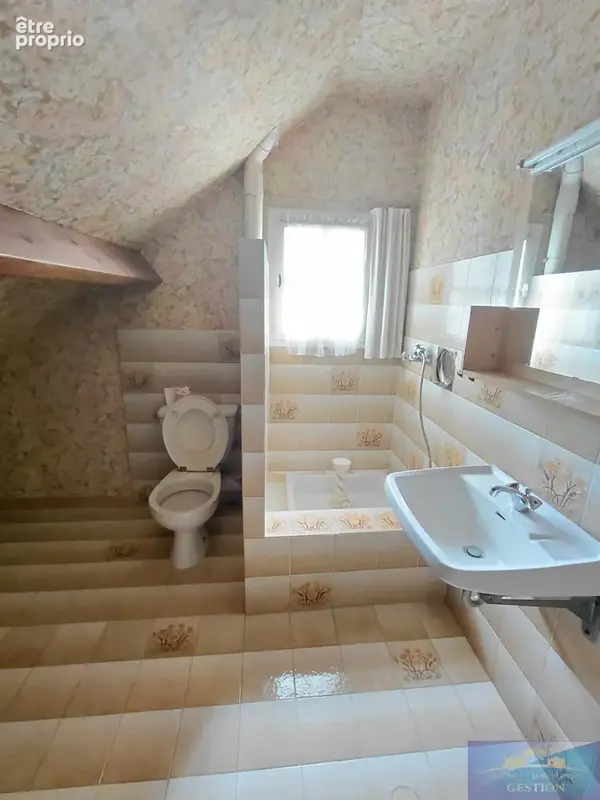 Maison élevée sur deux niveaux avec terrain et garage - photo 17