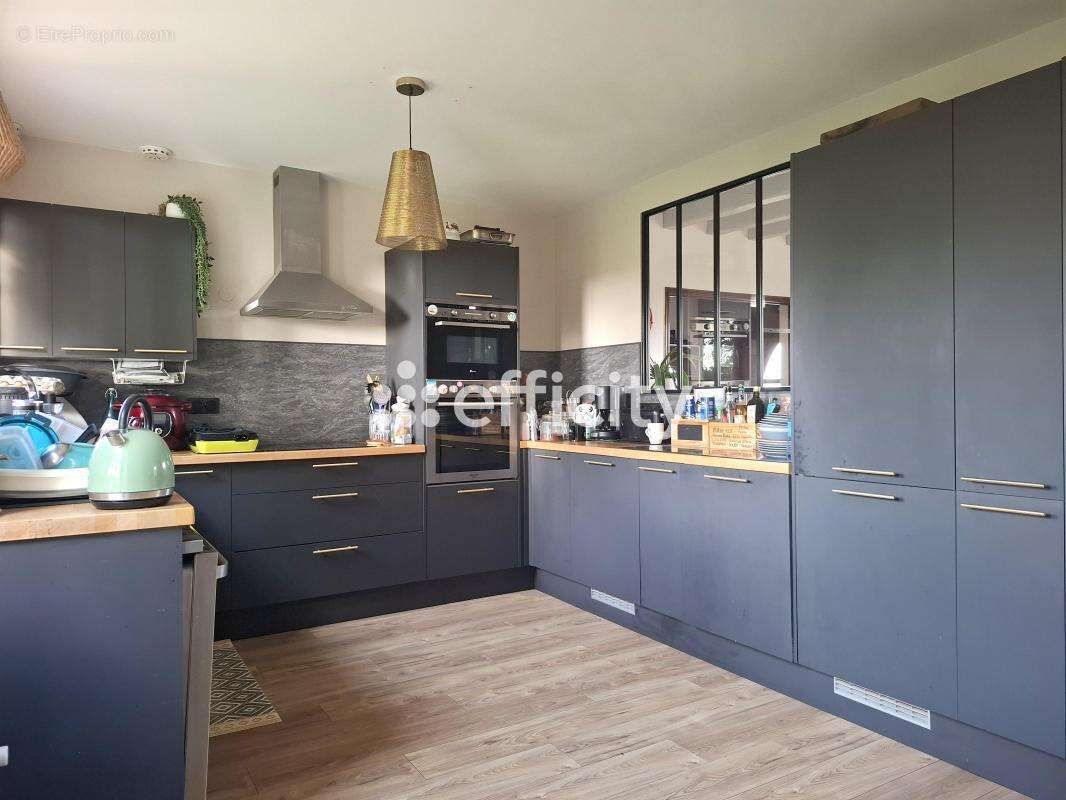 Maison à CONDE-SUR-HUISNE