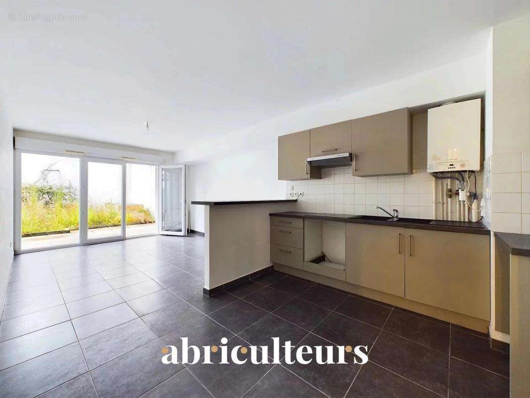 Appartement 3 pièces avec jardin privatif – Rue Théophile Guillou, 44800 Saint-Herblain - photo 2