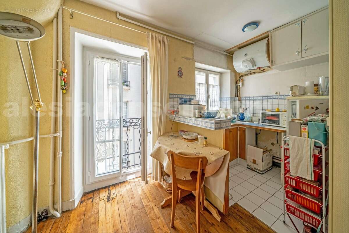 Photo n°5 - Appartement à PARIS-14E