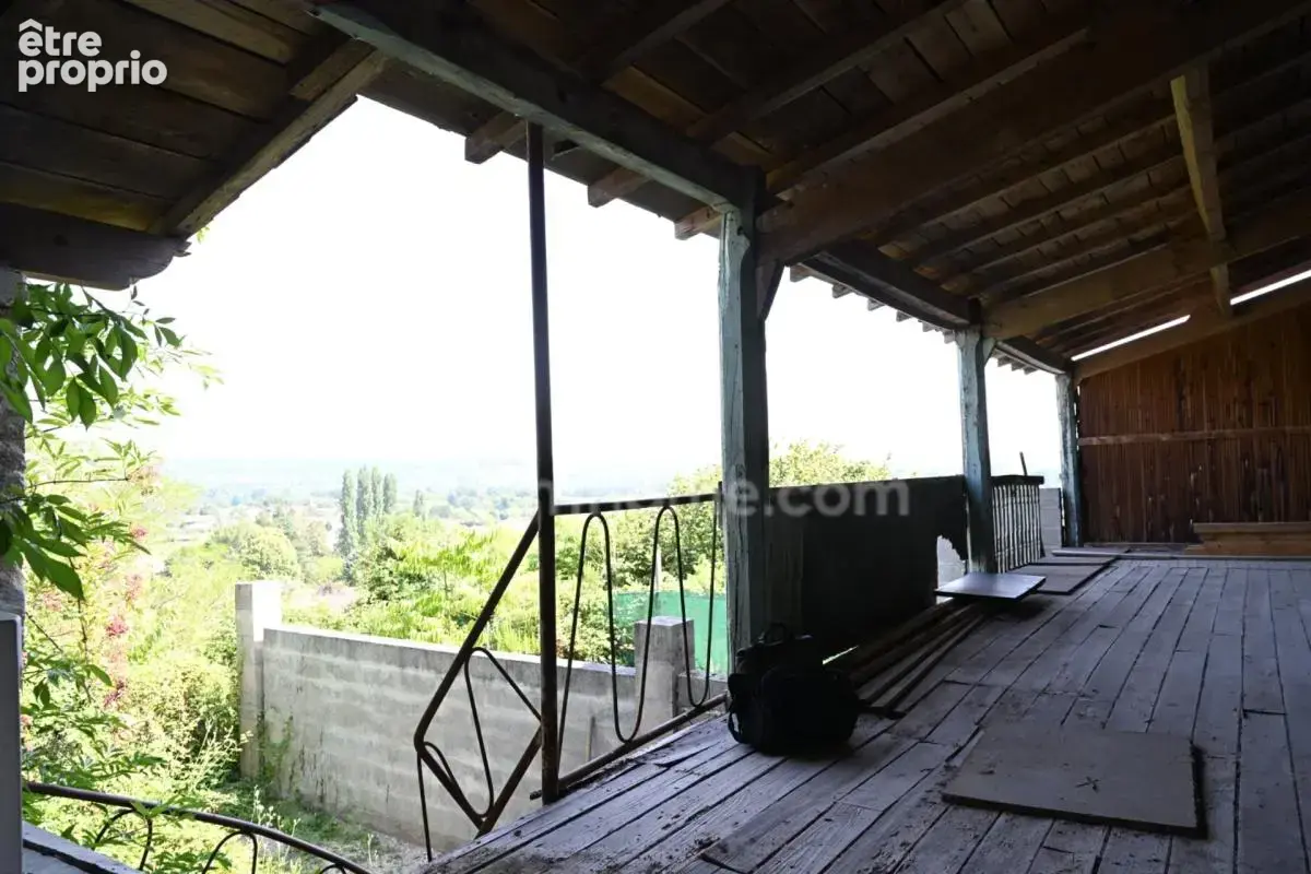 Maison en pierre avec deux logements, terrasse panoramique et potentiel exceptionnel à DOUZILLAC (24) - photo 9