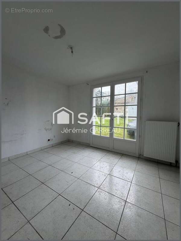 Photo 2 - Maison à GENESTON