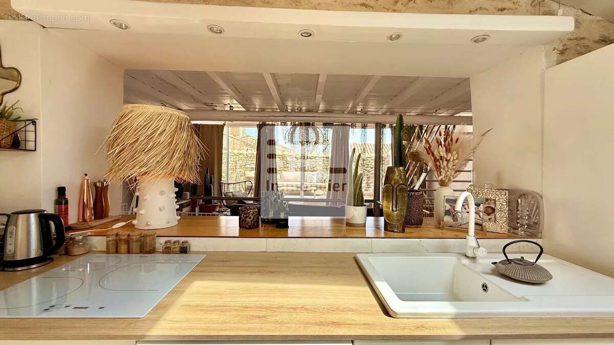 Maison à LAUDUN-L'ARDOISE