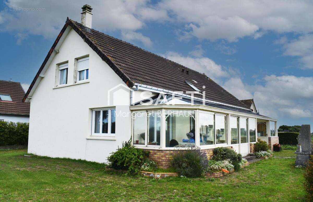 Photo 3 - Maison à URVILLE-NACQUEVILLE