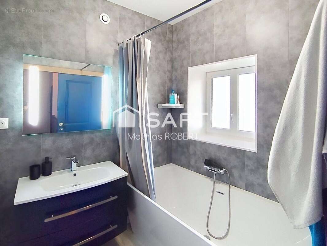 Maison 110 m² à Saint-Amant-De-Boixe  - photo 8