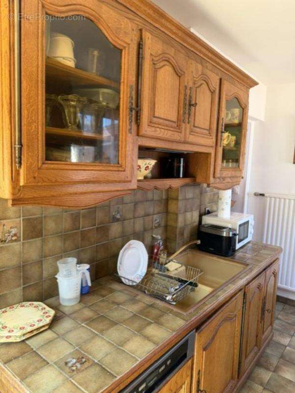 Coquette maison mitoyenne habitable sur 2 niveaux - photo 3
