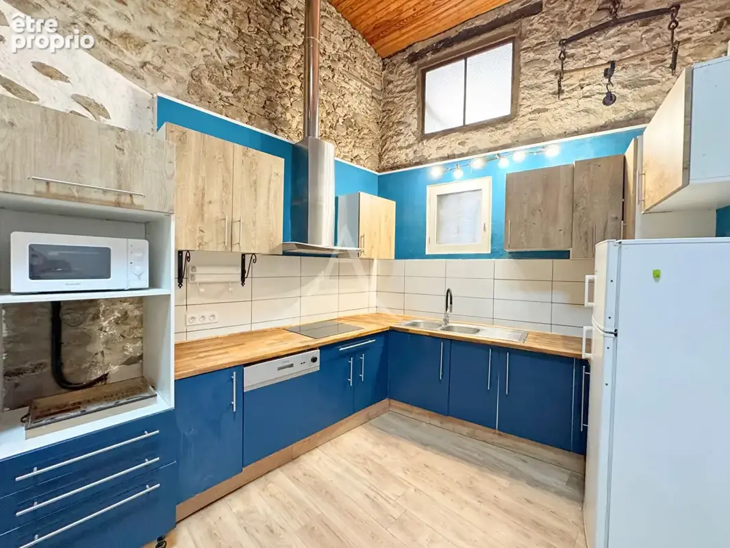 Vinca : maison de ville 3 pièces - 87 m²  pierres apparentes et cachet de l'ancien !! - photo 4
